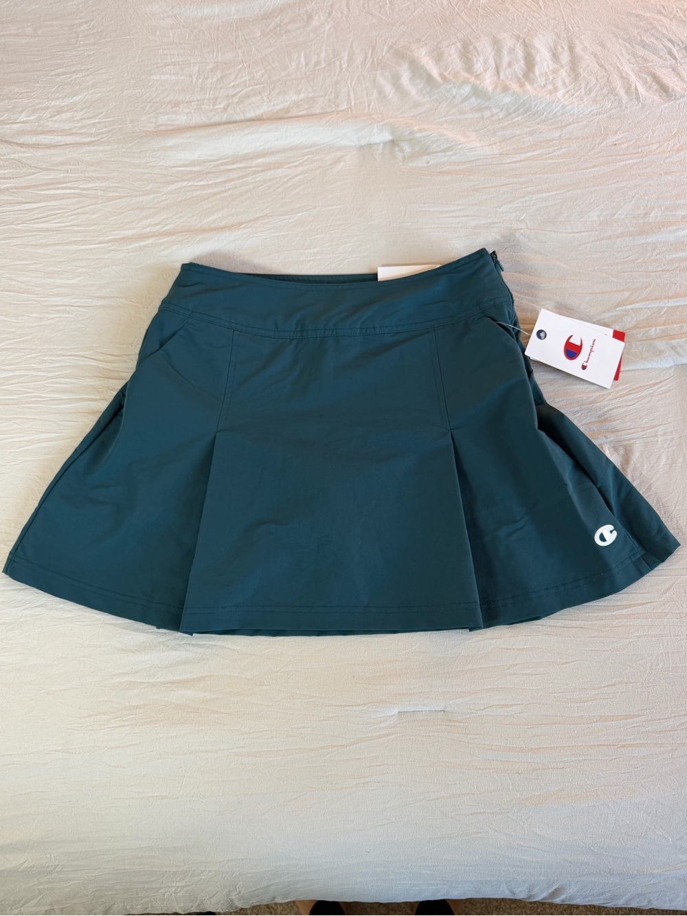 Champion - Women's Pleated Skort
- Teal Blue Size 4
